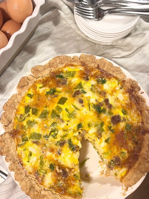 Simply yet delicious quiche with sauage, onions, and peppers